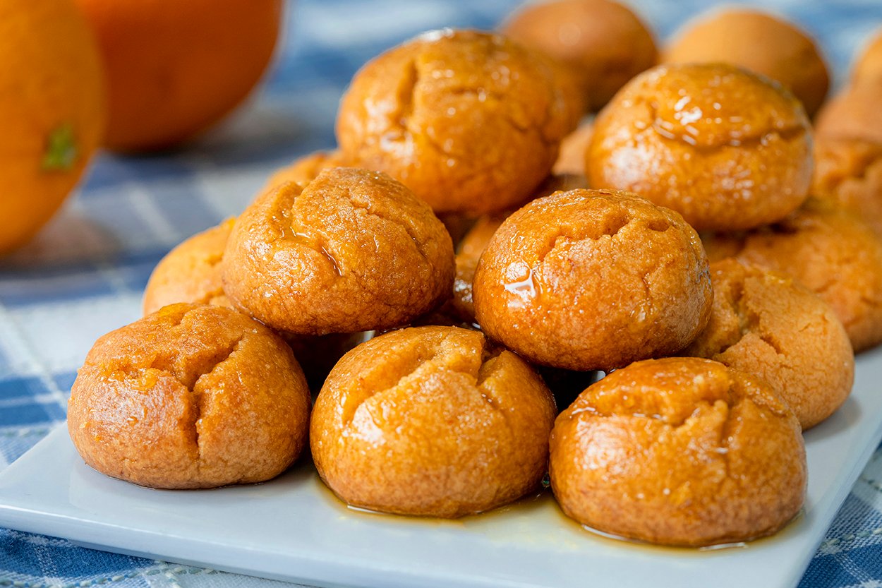 https://yemek.com/tarif/portakal-soslu-islak-kurabiye/ | Portakallı Islak Kurabiye Tarifi